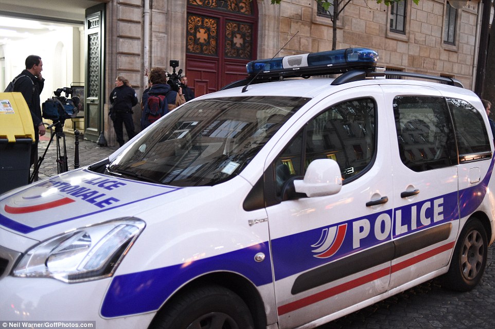 390C1E0200000578-3818985-Police_officers_remain_at_the_apartment_building_in_Paris_where_-a-20_1475477642273